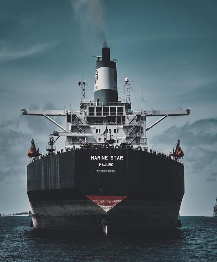 Bow view of a bulk carrier at anchor